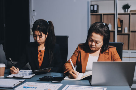 Business Documents, Auditor businesswoman checking searching document legal prepare paperwork or report for analysis TAX time,accountant Documents data contract partner deal in workplace officeの写真素材