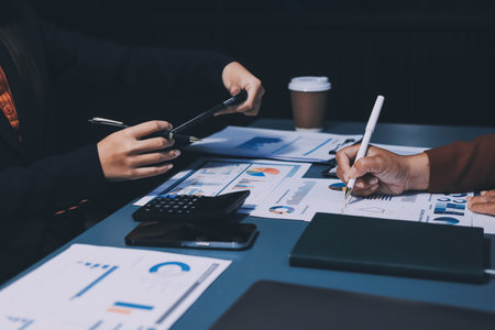 Business Documents, Auditor businesswoman checking searching document legal prepare paperwork or report for analysis TAX time,accountant Documents data contract partner deal in workplace officeの写真素材