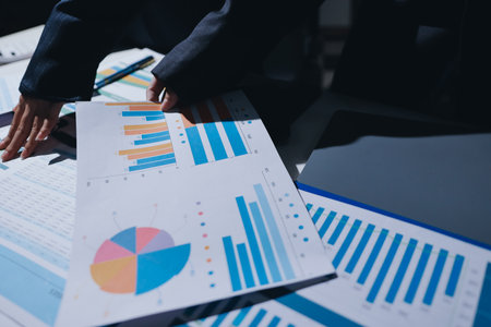 Two business people analyzing the data