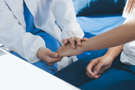 The doctor is checking and encouraging the patient.