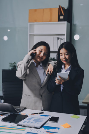Accounting company provide finance and taxation planning for profitable cash flow, Auditor and accountant team working in office, analyze financial data and accounting record with calculator.Insightの写真素材
