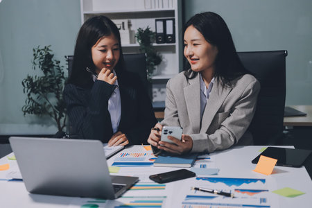 Accounting company provide finance and taxation planning for profitable cash flow, Auditor and accountant team working in office, analyze financial data and accounting record with calculator.Insightの写真素材