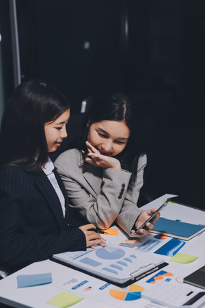 Accounting company provide finance and taxation planning for profitable cash flow, Auditor and accountant team working in office, analyze financial data and accounting record with calculator.Insightの写真素材