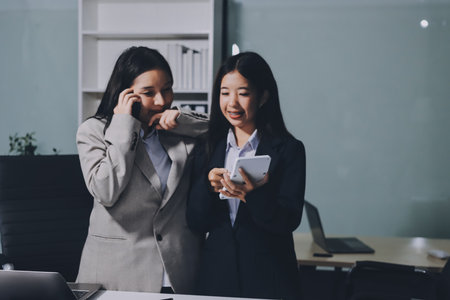 Accounting company provide finance and taxation planning for profitable cash flow, Auditor and accountant team working in office, analyze financial data and accounting record with calculator.Insightの写真素材