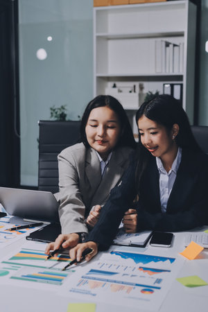 Accounting company provide finance and taxation planning for profitable cash flow, Auditor and accountant team working in office, analyze financial data and accounting record with calculator.Insightの写真素材