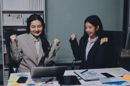 Accounting company provide finance and taxation planning for profitable cash flow, Auditor and accountant team working in office, analyze financial data and accounting record with calculator.Insightの写真素材
