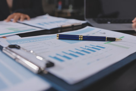 Team of business people working together in the meeting room office,teamwork background charts and graphs banner, double exposure successful teamwork,business planning concept.の写真素材