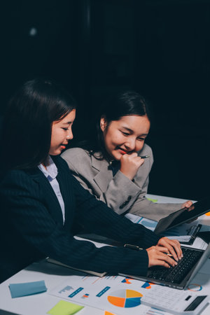 Accounting company provide finance and taxation planning for profitable cash flow, Auditor and accountant team working in office, analyze financial data and accounting record with calculator.Insightの写真素材