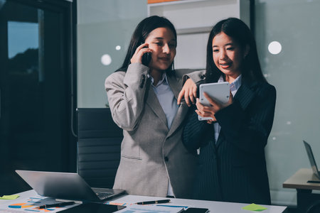 Accounting company provide finance and taxation planning for profitable cash flow, Auditor and accountant team working in office, analyze financial data and accounting record with calculator.Insightの写真素材