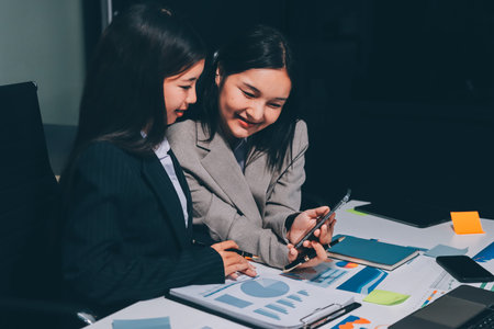 Accounting company provide finance and taxation planning for profitable cash flow, Auditor and accountant team working in office, analyze financial data and accounting record with calculator.Insightの写真素材