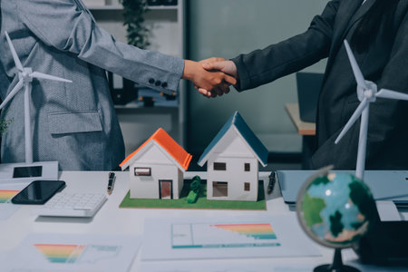 Business team people planning and discussing on recycle reduce reuse policy symbol in office meeting room.の写真素材