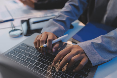 Team of business people working together in the meeting room office, teamwork background charts and graphs banner, double exposure successful teamwork,business planning concept.の写真素材