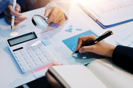 Team of business people working together in the meeting room office, teamwork background charts and graphs banner, double exposure successful teamwork,business planning concept.の写真素材