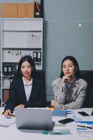 Accounting company provide finance and taxation planning for profitable cash flow, Auditor and accountant team working in office, analyze financial data and accounting record with calculator.Insightの写真素材