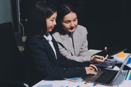 Accounting company provide finance and taxation planning for profitable cash flow, Auditor and accountant team working in office, analyze financial data and accounting record with calculator.Insightの写真素材