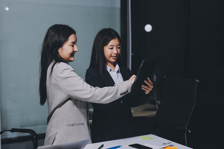 Accounting company provide finance and taxation planning for profitable cash flow, Auditor and accountant team working in office, analyze financial data and accounting record with calculator.Insightの写真素材