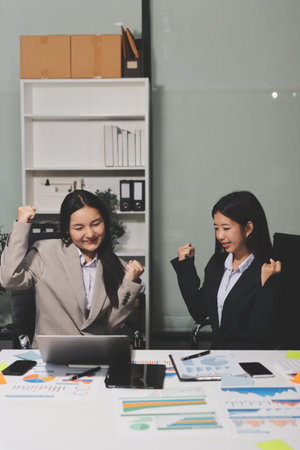 Accounting company provide finance and taxation planning for profitable cash flow, Auditor and accountant team working in office, analyze financial data and accounting record with calculator.Insightの写真素材