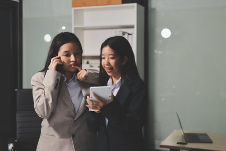 Accounting company provide finance and taxation planning for profitable cash flow, Auditor and accountant team working in office, analyze financial data and accounting record with calculator.Insightの写真素材