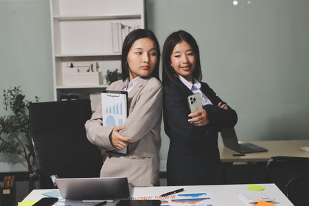 Accounting company provide finance and taxation planning for profitable cash flow, Auditor and accountant team working in office, analyze financial data and accounting record with calculator.Insightの写真素材