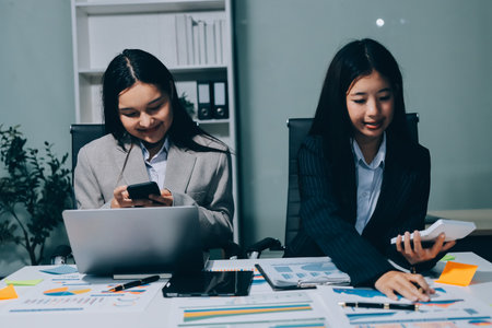 Accounting company provide finance and taxation planning for profitable cash flow, Auditor and accountant team working in office, analyze financial data and accounting record with calculator.Insightの写真素材