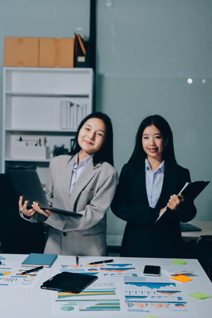 Accounting company provide finance and taxation planning for profitable cash flow, Auditor and accountant team working in office, analyze financial data and accounting record with calculator.Insightの写真素材