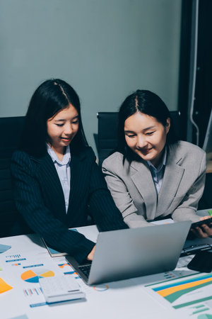Accounting company provide finance and taxation planning for profitable cash flow, Auditor and accountant team working in office, analyze financial data and accounting record with calculator.Insightの写真素材