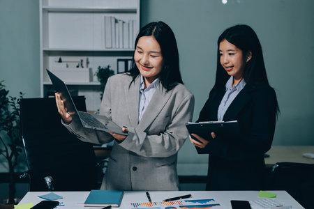 Accounting company provide finance and taxation planning for profitable cash flow, Auditor and accountant team working in office, analyze financial data and accounting record with calculator.Insightの写真素材