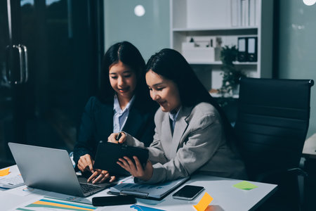 Accounting company provide finance and taxation planning for profitable cash flow, Auditor and accountant team working in office, analyze financial data and accounting record with calculator.Insightの写真素材