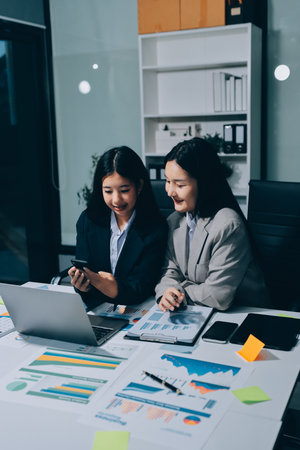 Accounting company provide finance and taxation planning for profitable cash flow, Auditor and accountant team working in office, analyze financial data and accounting record with calculator.Insightの写真素材