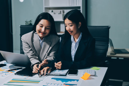 Accounting company provide finance and taxation planning for profitable cash flow, Auditor and accountant team working in office, analyze financial data and accounting record with calculator.Insightの写真素材
