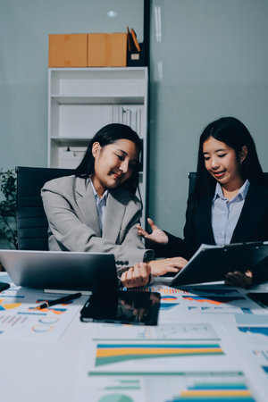 Accounting company provide finance and taxation planning for profitable cash flow, Auditor and accountant team working in office, analyze financial data and accounting record with calculator.Insightの写真素材