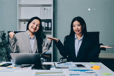 Accounting company provide finance and taxation planning for profitable cash flow, Auditor and accountant team working in office, analyze financial data and accounting record with calculator.Insightの写真素材