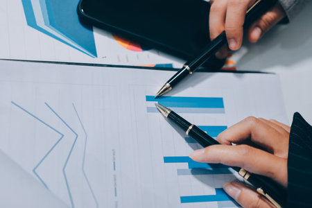 Accounting company provide finance and taxation planning for profitable cash flow, Auditor and accountant team working in office, analyze financial data and accounting record with calculator.Insightの写真素材