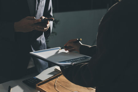 Lawyer explained to the client about the law that must be brought against the court case.