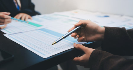 Success, audience with an applause and in a business meeting at work with a lens flare together. Achievement or celebration, motivation and businesspeople clapping hands for good news or supportの写真素材