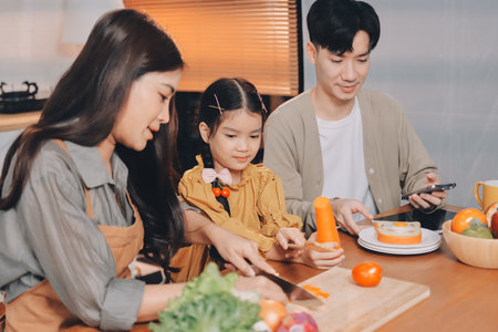 Family spends their free time togetherの写真素材