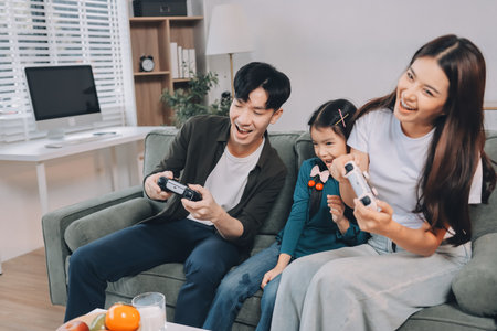 Family spends their free time togetherの写真素材