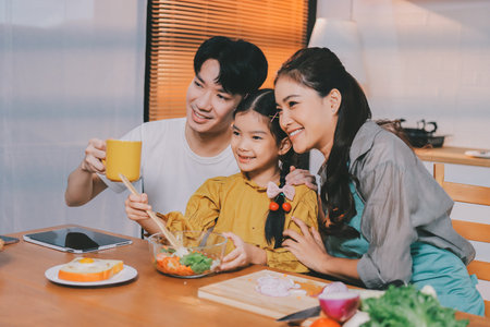 Family spends their free time togetherの写真素材