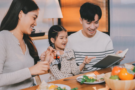 Family spends their free time togetherの写真素材