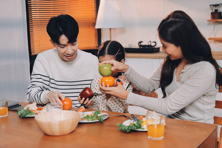 Family spends their free time togetherの写真素材