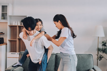 Family spends their free time togetherの写真素材