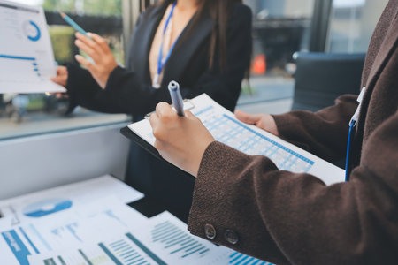 Success, audience with an applause and in a business meeting at work with a lens flare together. Achievement or celebration, motivation and businesspeople clapping hands for good news or supportの写真素材