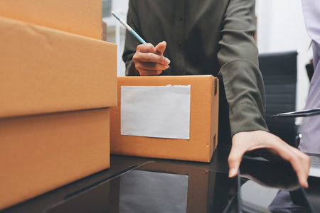 Portrait of Starting small businesses SME owners, two Asian woman check online orders Selling...