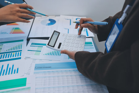 Success, audience with an applause and in a business meeting at work with a lens flare together. Achievement or celebration, motivation and businesspeople clapping hands for good news or supportの写真素材