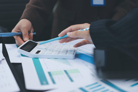 Success, audience with an applause and in a business meeting at work with a lens flare together. Achievement or celebration, motivation and businesspeople clapping hands for good news or supportの写真素材