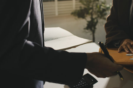 Lawyer explained to the client about the law that must be brought against the court case.