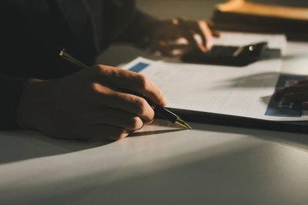 Lawyer explained to the client about the law that must be brought against the court case.の写真素材