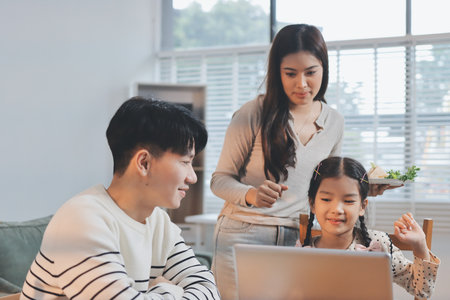 Family spends their free time togetherの写真素材