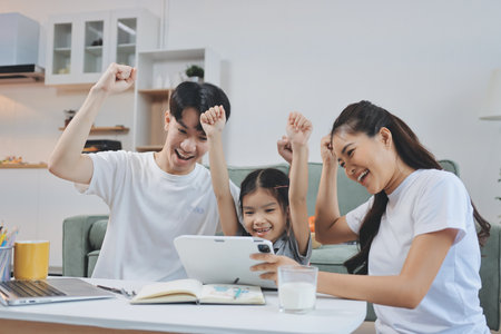 Family spends their free time togetherの写真素材