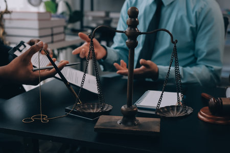 Lawyer explained to the client about the law that must be brought against the court case.の写真素材